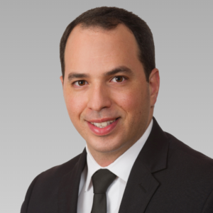professional headshot on a neutral background