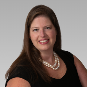professional headshot on a neutral background